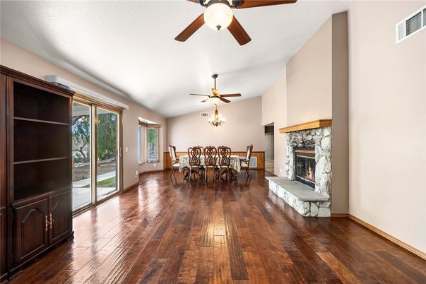 Chandelier, Dining room, Fireplace, Interior, Wood Texture Flooring