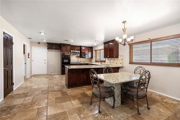 Chandelier, Dining room, Interior, Kitchen, Recessed Lighting, Stainless Steel Appliances
