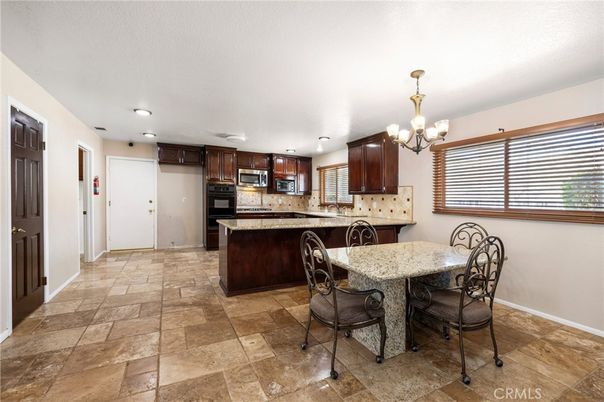 Chandelier, Dining room, Interior, Kitchen, Recessed Lighting, Stainless Steel Appliances