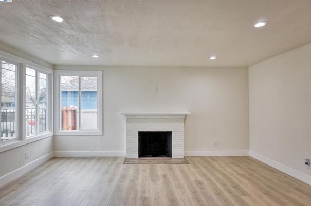 Empty room, Fireplace, Interior, Recessed Lighting, Wood Texture Flooring