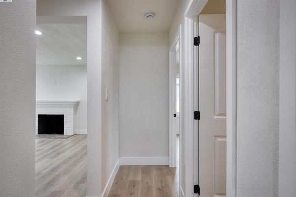Fireplace, Interior, Recessed Lighting, Wood Texture Flooring