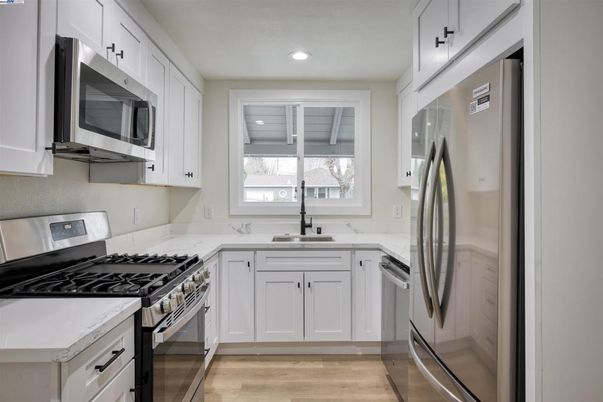 Interior, Kitchen, Recessed Lighting, Stainless Steel Appliances, Wood Texture Flooring
