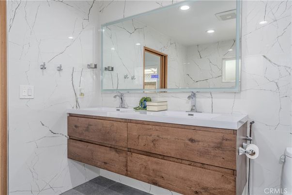 Bathroom, Dual Sink Vanities, Interior, Marble Walls, Recessed Lighting