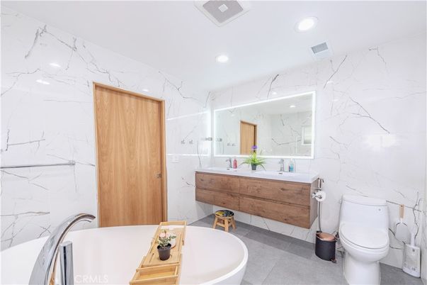 Bathroom, Dual Sink Vanities, Free Standing Baths, Interior, Marble Walls, Recessed Lighting