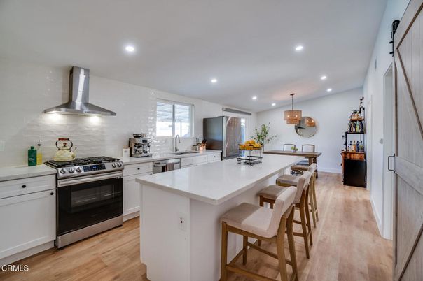 Interior, Kitchen, Pendant Lights, Recessed Lighting, Stainless Steel Appliances, Wood Texture Flooring