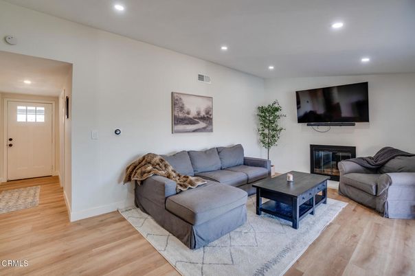 Fireplace, Interior, Living room, Recessed Lighting, Wood Texture Flooring