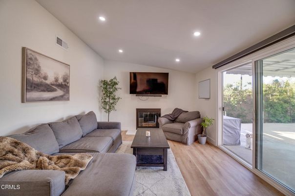 Fireplace, Interior, Living room, Recessed Lighting, Wood Texture Flooring