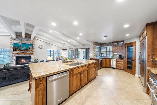Fireplace, Interior, Kitchen, Living room, Pendant Lights, Recessed Lighting, Stainless Steel Appliances