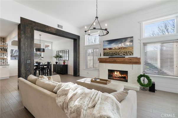 Dining room, Fireplace, Interior, Living room, Pendant Lights, Wood Texture Flooring
