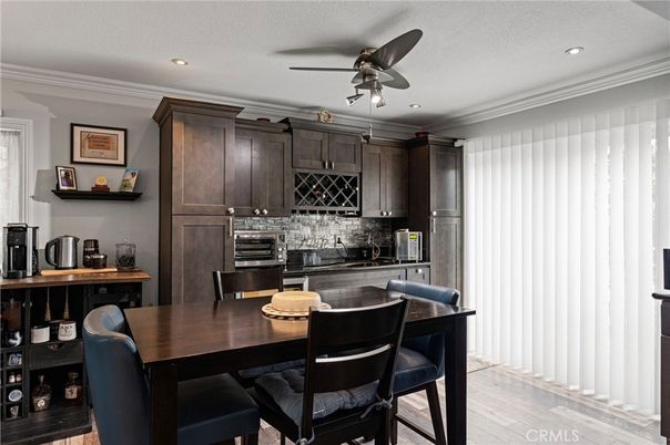 Dining room, Interior, Kitchen, Recessed Lighting, Stainless Steel Appliances, Wood Texture Flooring