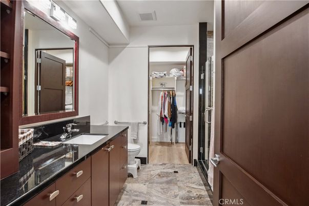 Bathroom, Dual Sink Vanities, Interior, Walk-in Closets, Wood Texture Flooring