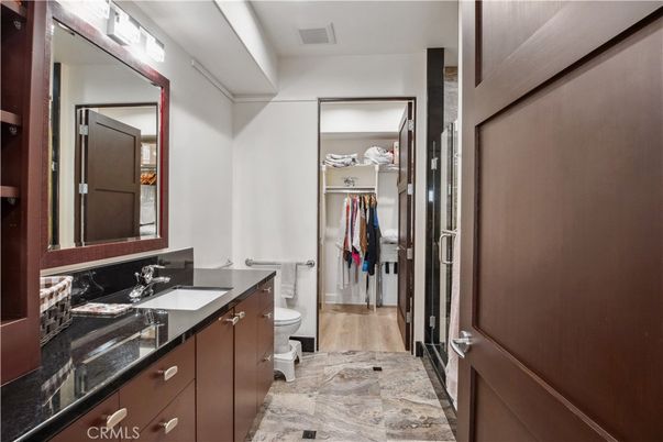 Bathroom, Dual Sink Vanities, Interior, Walk-in Closets, Wood Texture Flooring