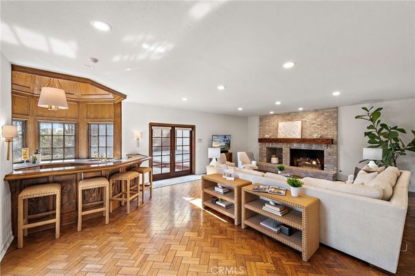 Fireplace, Interior, Living room, Recessed Lighting, Stone Walls, Wood Texture Flooring