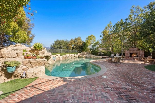 Exterior, Fireplace, Pool