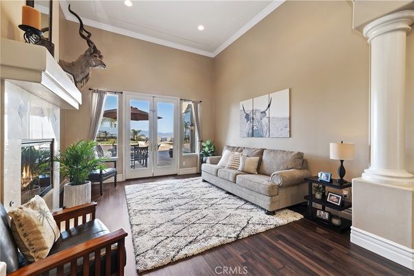 Fireplace, Interior, Living room, Recessed Lighting, Water, Wood Texture Flooring