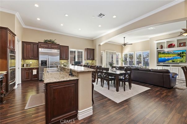 Dining room, Interior, Kitchen, Living room, Recessed Lighting, Stainless Steel Appliances, Wood Texture Flooring