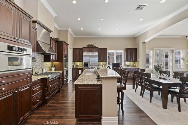 Dining room, Interior, Kitchen, Recessed Lighting, Stainless Steel Appliances, Wood Texture Flooring