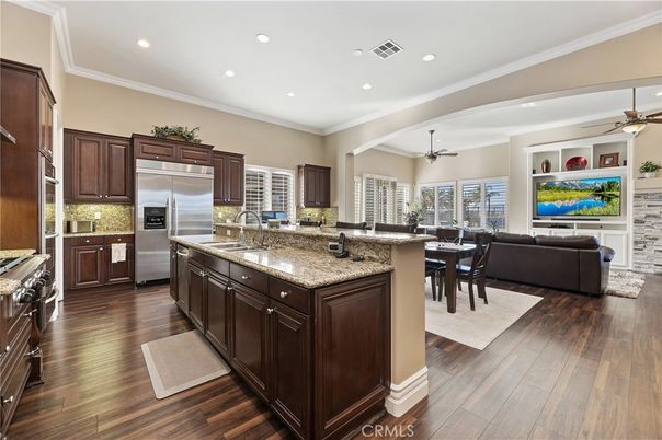 Dining room, Interior, Kitchen, Living room, Recessed Lighting, Stainless Steel Appliances, Wood Texture Flooring