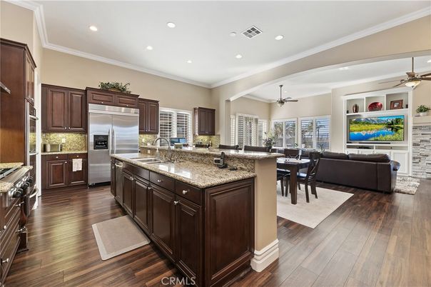 Dining room, Interior, Kitchen, Living room, Recessed Lighting, Stainless Steel Appliances, Wood Texture Flooring