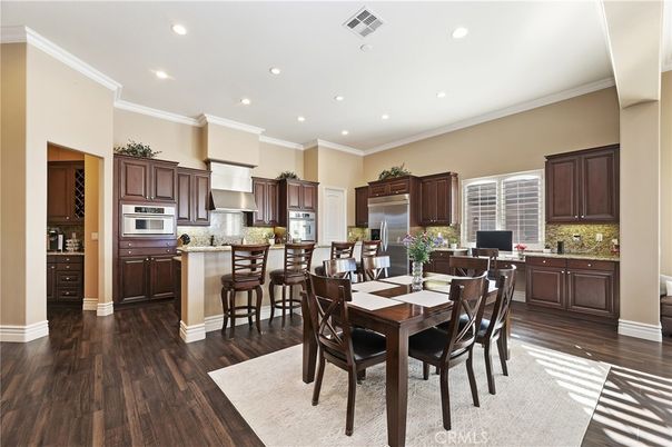 Dining room, Interior, Kitchen, Recessed Lighting, Stainless Steel Appliances, Wood Texture Flooring