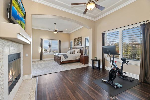 Bedroom, Fireplace, Fitness Equipment, Interior, Recessed Lighting, Wood Texture Flooring