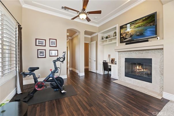 Fireplace, Fitness Equipment, Interior, Recessed Lighting, Wood Texture Flooring