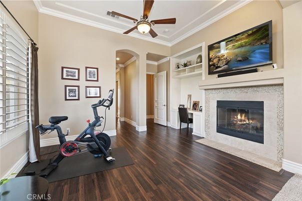 Fireplace, Fitness Equipment, Interior, Recessed Lighting, Wood Texture Flooring
