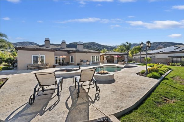 Exterior, Pool, Solar Panels