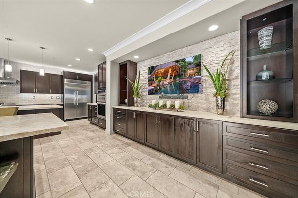 Interior, Kitchen, Pendant Lights, Recessed Lighting, Stainless Steel Appliances, Stone Walls
