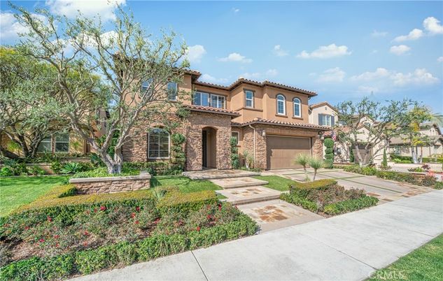 Attached, Backyard, Exterior, Facade, Brick Facade, Mediterranean