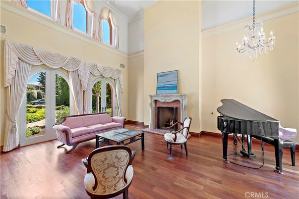 Chandelier, Fireplace, Interior, Living room, Piano, Wood Texture Flooring