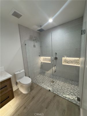 Bathroom, Glass Shower, Interior, Recessed Lighting, Wood Texture Flooring