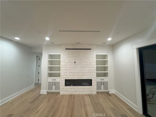 Empty room, Fireplace, Interior, Recessed Lighting, Wood Texture Flooring