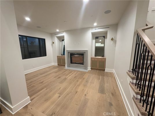 Empty room, Fireplace, Interior, Recessed Lighting, Wood Texture Flooring
