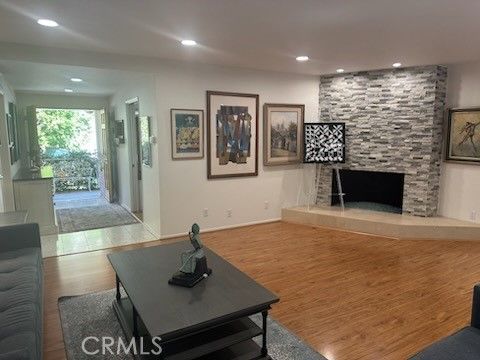 Fireplace, Interior, Recessed Lighting, Stone Walls, Wood Texture Flooring