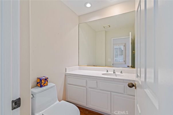Bathroom, Interior, Recessed Lighting, Tile Countertops, Wood Texture Flooring