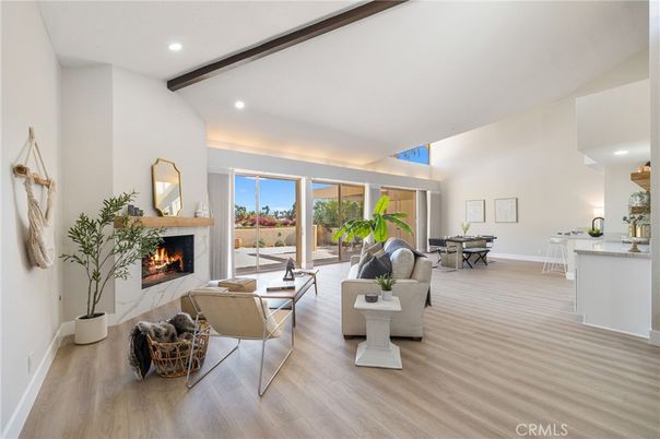 Dining room, Fireplace, Interior, Living room, Recessed Lighting, Wooden Beams, Wood Texture Flooring