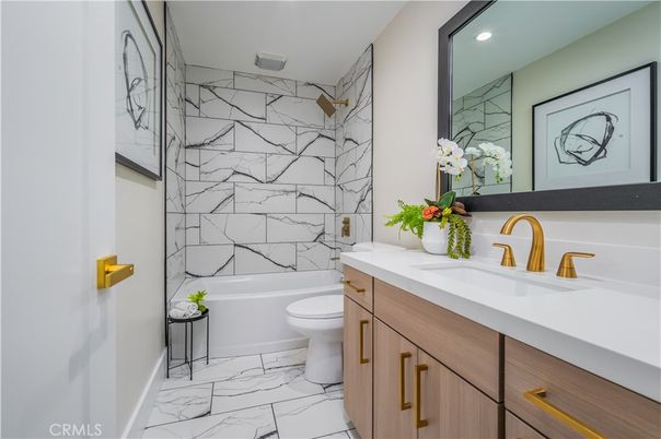 Bathroom, Dual Sink Vanities, Interior, Marble, Marble Walls, Recessed Lighting