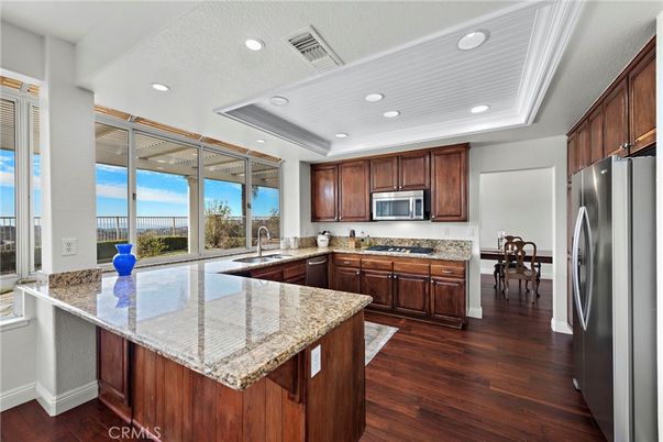 Dining room, Interior, Kitchen, Recessed Lighting, Stainless Steel Appliances, Wood Texture Flooring