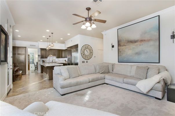 Chandelier, Interior, Kitchen, Living room, Pendant Lights, Recessed Lighting, Stainless Steel Appliances, Wood Texture Flooring