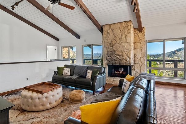 Fireplace, Interior, Living room, Stone Walls, Wooden Beams, Wood Texture Flooring