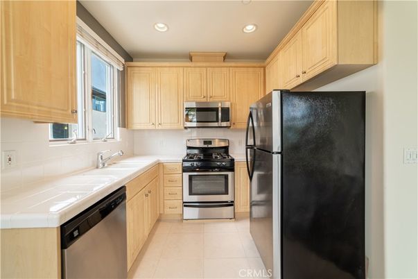 Interior, Kitchen, Recessed Lighting, Stainless Steel Appliances, Tile Countertops