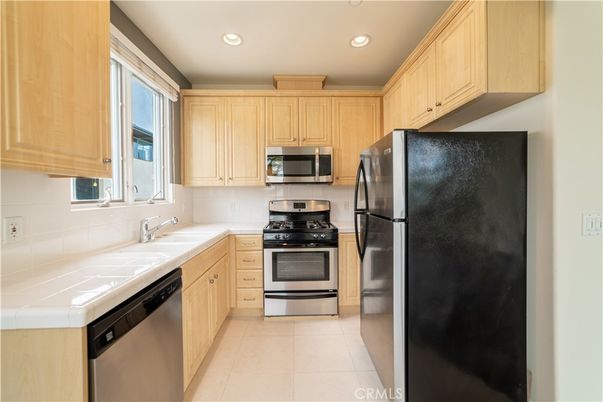 Interior, Kitchen, Recessed Lighting, Stainless Steel Appliances, Tile Countertops
