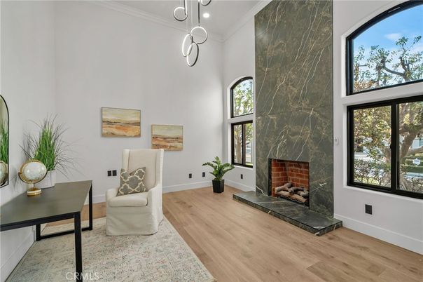 Fireplace, Interior, Marble Walls, Pendant Lights, Wood Texture Flooring