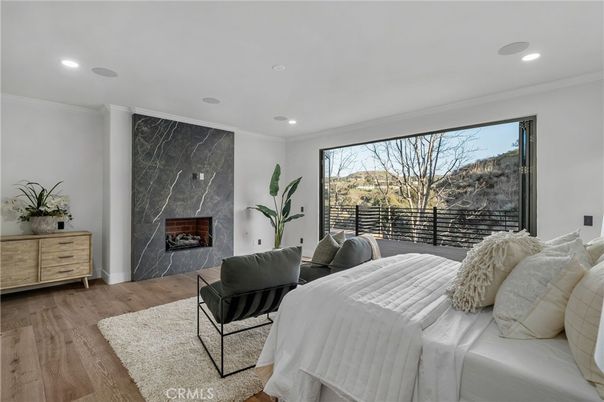Bedroom, Fireplace, Interior, Marble Walls, Recessed Lighting, Wood Texture Flooring