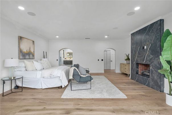 Bedroom, Fireplace, Interior, Living room, Recessed Lighting, Wood Texture Flooring