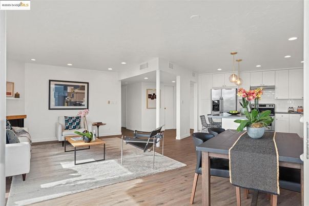 Dining room, Interior, Kitchen, Living room, Pendant Lights, Recessed Lighting, Stainless Steel Appliances, Wood Texture Flooring
