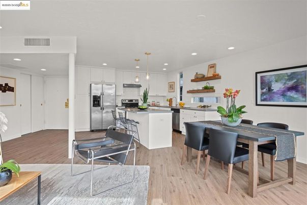 Dining room, Interior, Kitchen, Pendant Lights, Recessed Lighting, Stainless Steel Appliances, Wood Texture Flooring