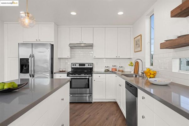 Interior, Kitchen, Pendant Lights, Recessed Lighting, Stainless Steel Appliances, Wood Texture Flooring