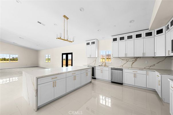 Interior, Kitchen, Marble Walls, Pendant Lights, Recessed Lighting, Stainless Steel Appliances